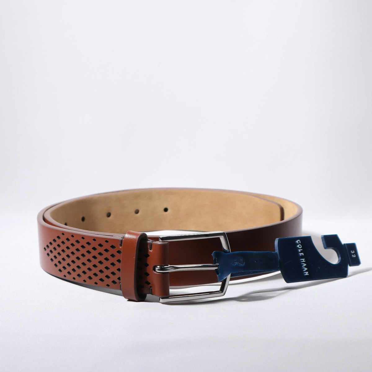 A brown leather belt is presented on a white background.