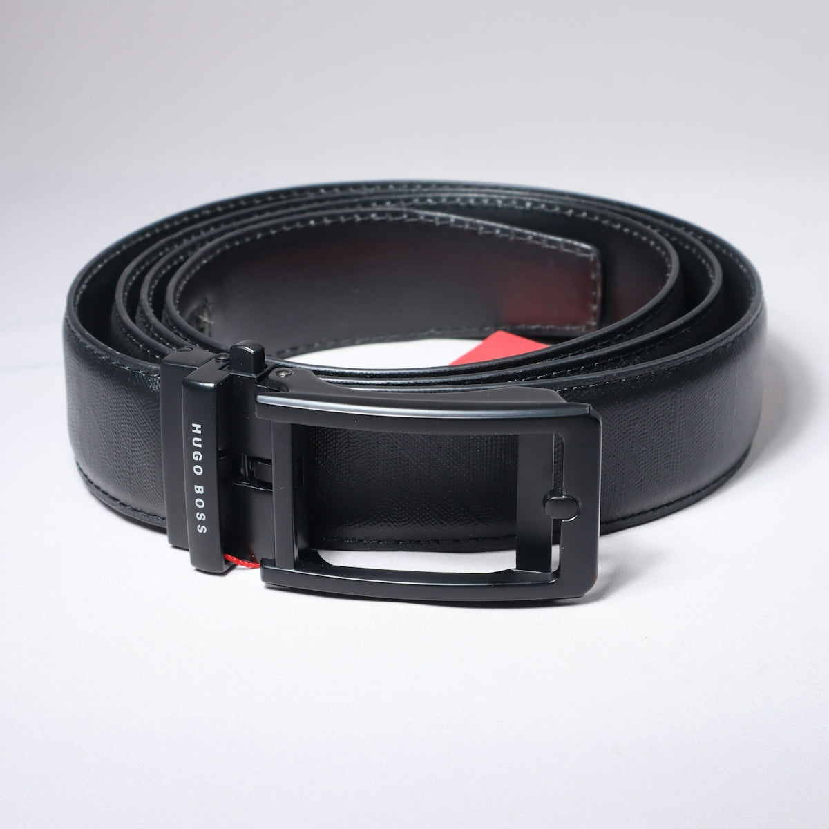 A black hugo boss belt is displayed.